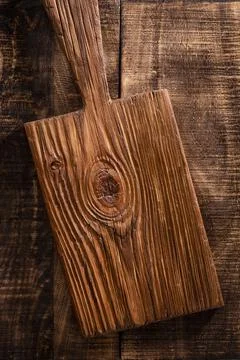 Empty cutting board Cutting Board on a old rustik table Stock Photos