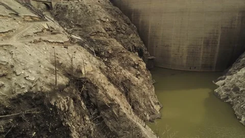 Empty dam of Contra, old road and bridge - aerial 4K Stock Footage 185958955