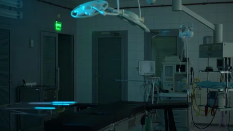 Empty dark operating room with innovative equipment. Modern surgical room with Stock Footage 260925744