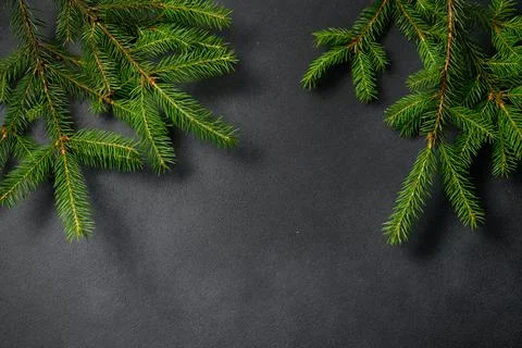 Empty Dark Textured Table with Fir Branches. Christmas and New Year Screensav Stock Photos