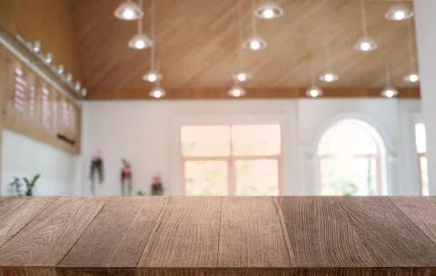 Empty dark wooden table in front of abstract blurred bokeh background of rest Stock Photos