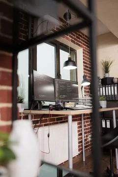 Empty data room with computer monitors on desk Stock Photos