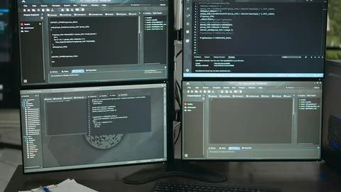 Empty data room with computer screens on desk Stockfoto's