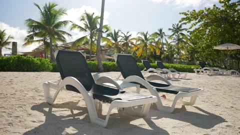 Empty deck chairs on a tropical beach. Stock Footage 167094790