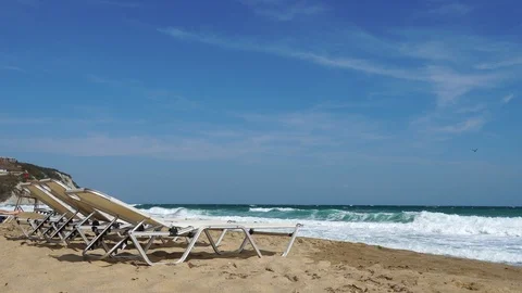 Empty deckchairs on the beach at the end of the bathing season Stock Footage 115974085