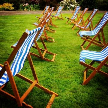 Empty deckchairs Stock Photos