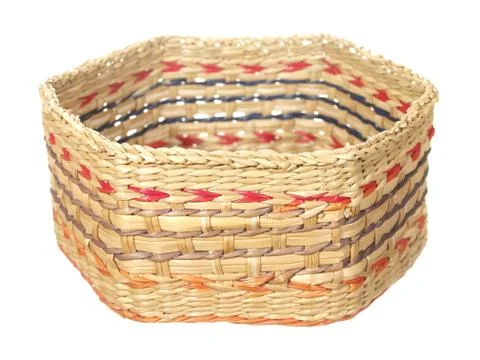 Empty decorative basket of hexagonal shape isolated on white background. Stock Photos
