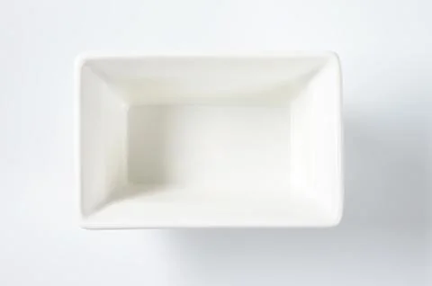 Empty deep rectangular white dish Foto stock