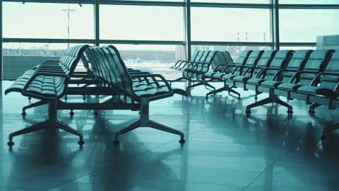 Empty departure lounge with seats marked unavailable Stock Footage 152618005