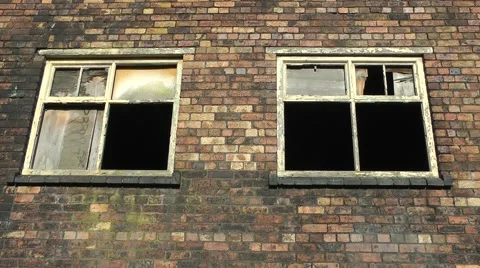 Empty derelict factory windows in golden light urban decay Stock Footage 47211292
