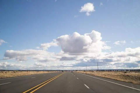 Empty desert highway Stock Photos