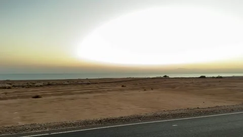 Empty Desert Railway Track &amp; Red Sea Horizon At Sunrise Stock Footage 337720204