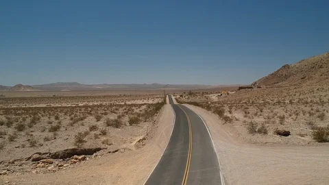 Empty desert road - drone view Stock Footage 107879629