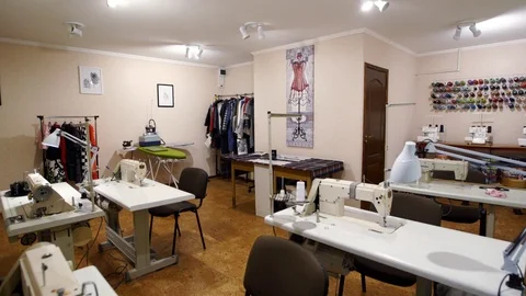 Empty designer atelier interior with tables and sewing machines. Equipped Video stock 95955763