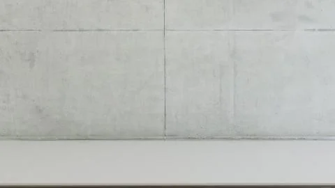 Empty desk with concrete wall 3D rendering Stock Photos