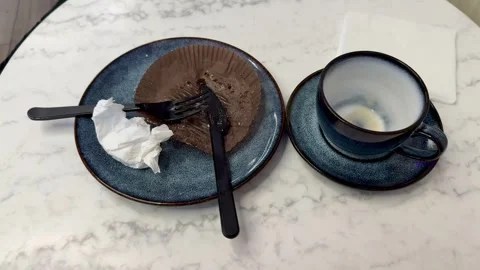 Empty Dessert Plate And Coffee Cup On Brown Cafeteria Tray With Crumpled Napkin Stock Footage 325228641