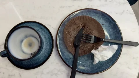 Empty Dessert Plate And Coffee Cup On Brown Cafeteria Tray With Crumpled Napkin Stock Footage 325229364
