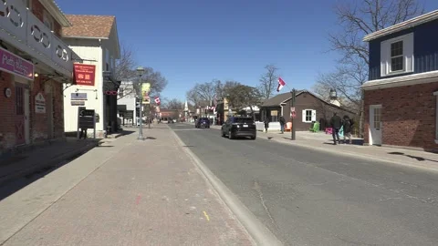Empty devastated small tourist town main street in COVID 19 pandemic lockdown Vídeo Stock 151570400