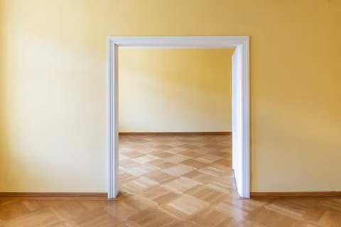 Empty dining or dancing room of an old vintage house with wooden parket Fotos de archivo
