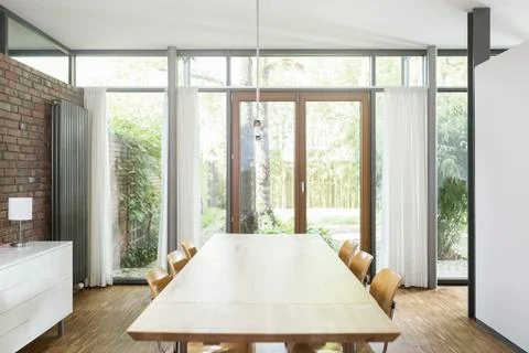 Empty dining room table Stock Photos