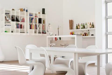 Empty dining table in a dining room Stock Photos