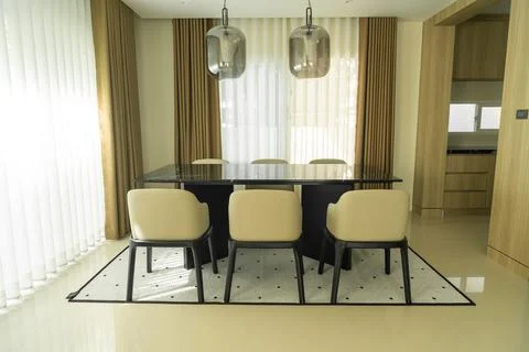 Empty dining table set and chair Stock Photos