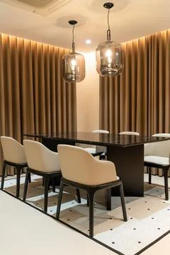 Empty dining table set and chair Stock Photos