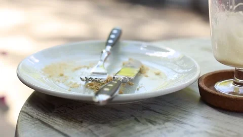 Empty dirty plates on the table at city cafe. Empty dishes after eating Stock Footage 159419503