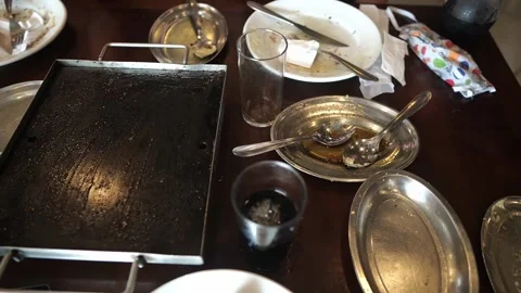 Empty dishes upon the table after the dinner party. Stock Footage 138855164
