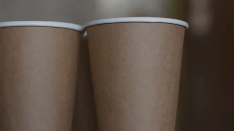 Empty Disposable eco (bio) cups Kraft. Rotation. Close-up Stock Footage 116878331