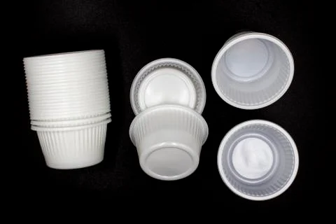 Empty Disposable Plastic Cup, Lying horizontally plastic cup isolated on blac Stock Photos