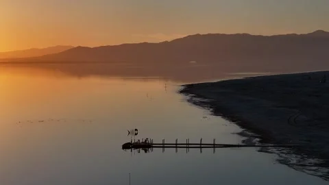 Empty Dock at Sunset of the Dock at the Salton Sea Bombay Beach California Stock Footage 336814785