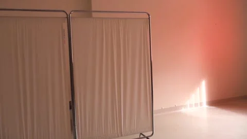 Empty Doctor's Office with Folding Screen and Sunlight Stock Footage 337429416