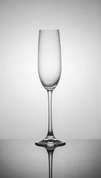 .empty drink glasses on dark background with back light Stock Photos