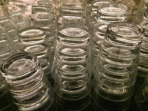 Empty drinking glasses stacked upside down Stock Photos