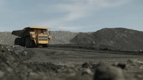 Empty dump truck moves quickly to load coal. Movement towards the camera. Stock Footage 205246162
