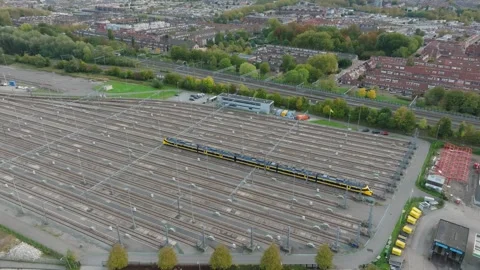 Empty Dutch NS train ICNG from Nederlandse Spoorwegen on shunting yard Stock Footage 321910482