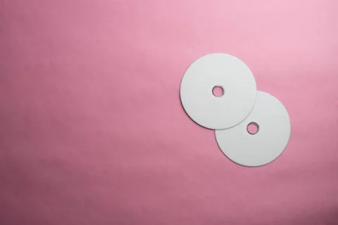 Empty DVD CD disk on colorful background Stock Photos