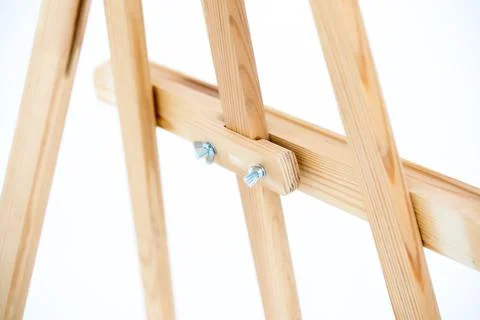 An empty easel isolated on a white background. Stock Photos