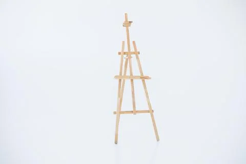 An empty easel isolated on a white background. Stock Photos