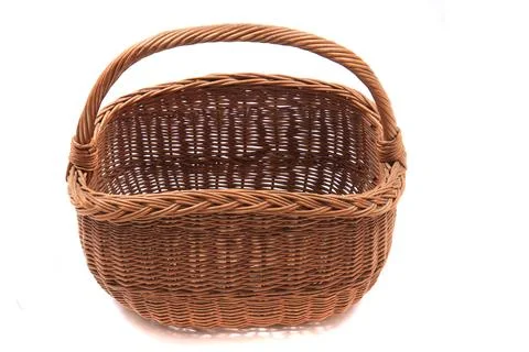 Empty easter natural basket isolated Stock Photos
