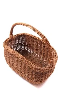 Empty easter natural basket isolated Stock Photos