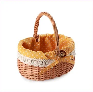 Empty Easter wicker basket with decorative fabric isolated on white Stock Photos