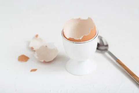 Empty eg shell or eaten eg on white background. copy space Stock Photos