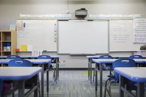 Empty elementary school classroom Stock Photos