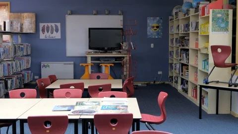 Empty Elementary School Library Due To Coronavirus, PAN LEFT Stock Footage 129679048