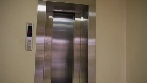Empty Elevator Doors Opening in Modern Corporate Building on Third Floor Stock Footage 306497441
