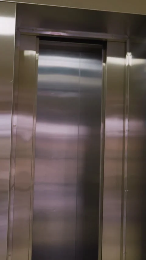 Empty Elevator Doors Opening in Modern Corporate Building on Third Floor Stock Footage 318805289