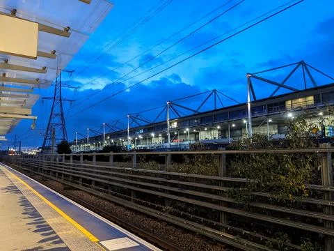 An empty Elizabeth Line platform at Custom House Station during dawn Stock Photos
