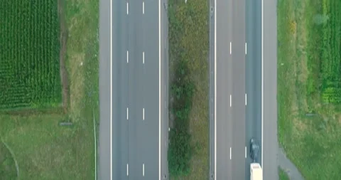 Empty endless autobahn road / two sided double way asphalt highway in arid rural 스톡 동영상 144609910